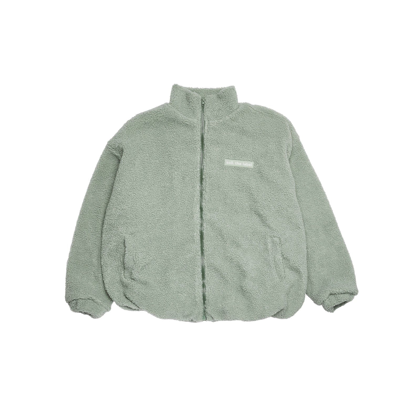 Adults Wooley Zip Jacket - Sage winter 23 soll. the label