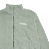 Adults Wooley Zip Jacket - Sage winter 23 soll. the label