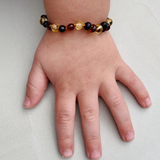 Cleanse & Co. Kids. Multi 3 Colour Amber Bracelet For Kids. Soll. The Label.